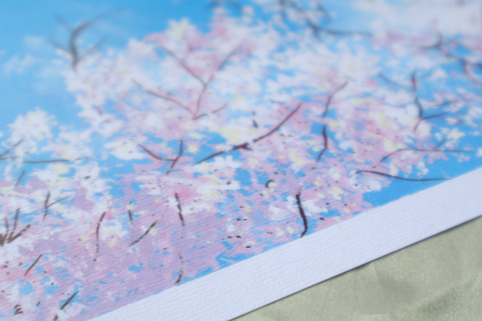 Close up view of the textured paper of the sakura flowers art print